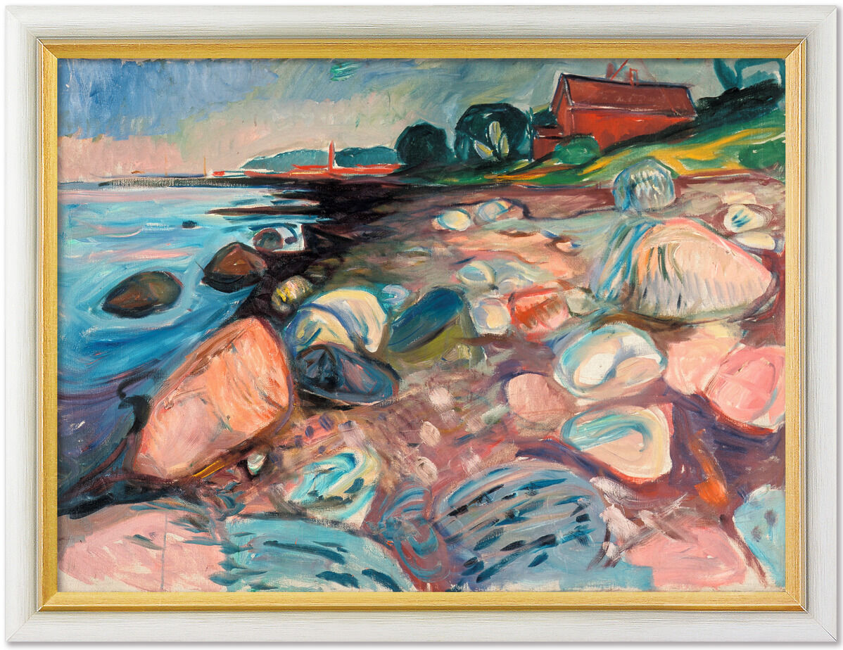 Expressionistisches Gemälde von Edvard Munch aus dem Jahr 1904, Motiv eines Strandabschnitts mit bunten Felsen, Wasser und dramatischer Farbgebung, gerahmt in Weiß-Gold. Am rechten oberen Rand ein rotes Haus, hinten schwache Andeutung von Vegetation und Horizont. Das Kunstwerk ist hell, lebendig und detailreich illustriert.