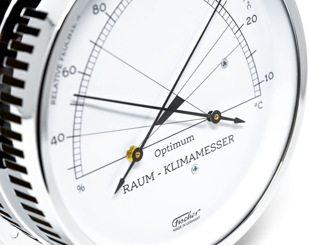 ZEIT-Sonderedition »Raumklimamesser« zeigt Temperaturen in Celsius und relative Luftfeuchtigkeit auf einer weißen Skala mit schwarzen Markierungen und silbernem Rand.