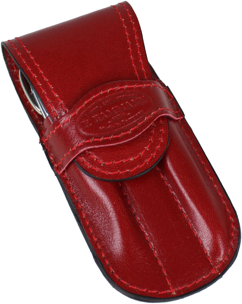Maniküreset Klassik aus Kalbleder. Das rote Lederetui ist hochwertig verarbeitet und enthält verschiedene Werkzeuge zur Nagelpflege. Ideal für unterwegs und als Geschenk geeignet.