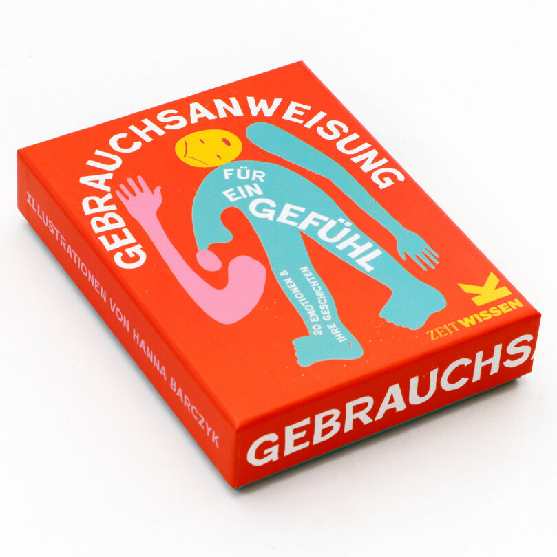 Dieses Bild zeigt ein Buch mit dem Titel 'Gebrauchsanweisung für ein Gefühl'. Die Buchabdeckung ist hauptsächlich rot mit bunten Elementen in Blau, Grün und Weiß.