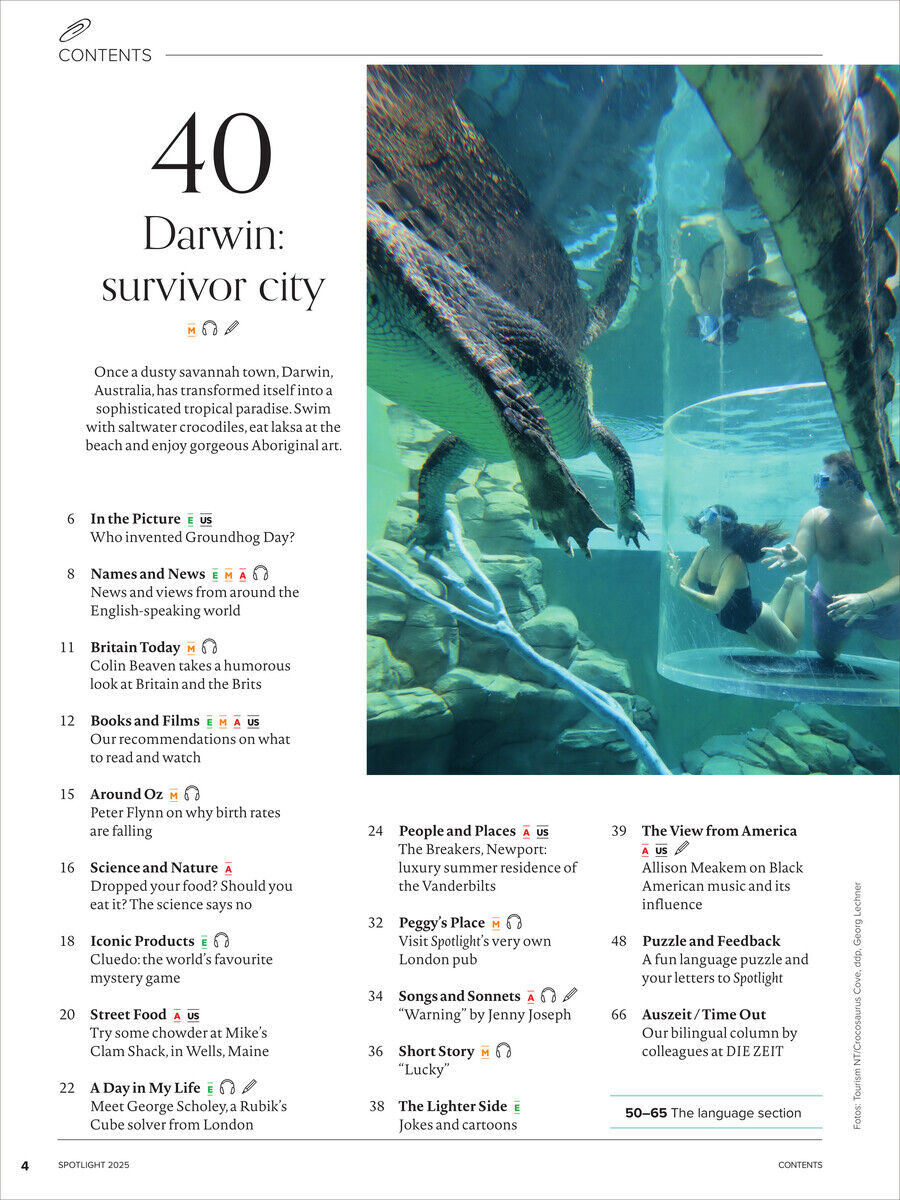 Das Foto zeigt eine Seite des Spotlight Magazins Ausgabe 3/2025 mit einem Hauptthema über Darwin, Australien, und das Überleben in der Stadt. Abgebildet ist ein Unterwassermotiv mit Menschen und einem Krokodil.