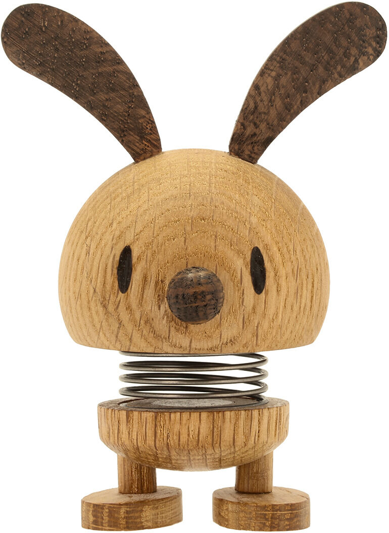 Holzfigur in Form eines Hasen mit langen Ohren und einem federnden Körper, gefertigt aus Eichenholz, bekannt als Hoptimist »Bunny«.