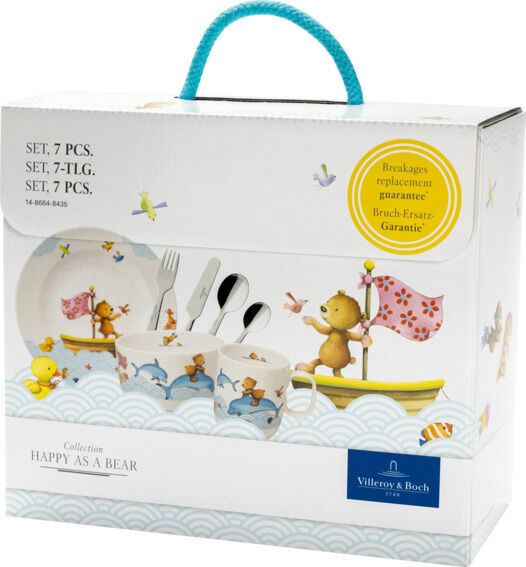 Kindergeschirrset 'Hungry as a Bear' von Villeroy & Boch, bestehend aus 7 Teilen: Teller, Schüssel, Tasse, und Besteck. Das Design zeigt einen Bären auf einem Boot, umgeben von bunten Motiven. Verpackung des Geschirrsets ist zu sehen.