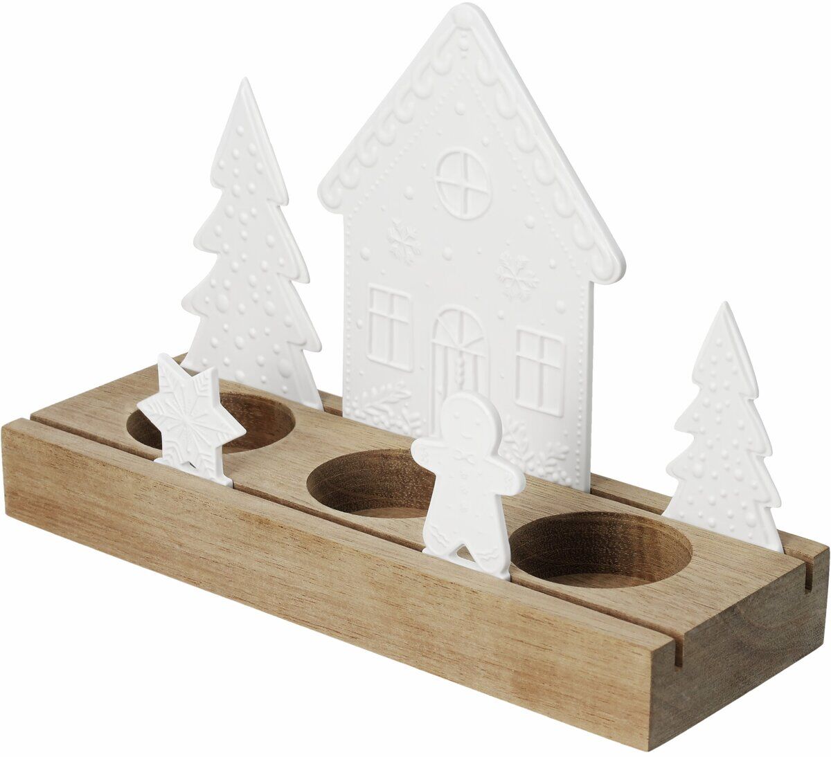 Das Bild zeigt das Lichtobjekt »Lebkuchendorf«: Eine rechteckige Holzbasis mit weißen, winterlichen Dekofiguren – Lebkuchenhaus, Tannenbäume, Stern, Lebkuchenmännchen. Drei kreisförmige Aussparungen sind für Teelichter vorgesehen. Ideal für weihnachtliche Dekoration.