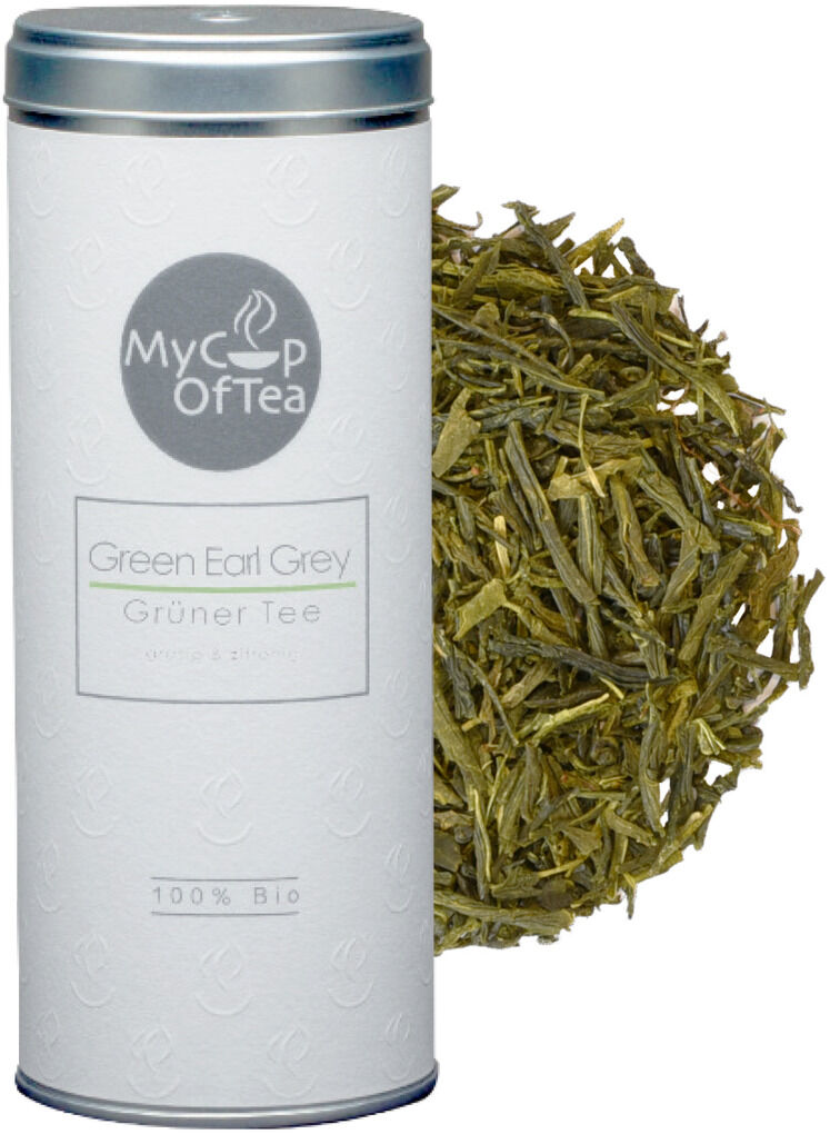 Produktbild eines Tee-Sets ‚Earl Grey‘. Die Verpackung ist eine silberne Dose mit einem weißen Etikett. Daneben befinden sich lose grüne Teeblätter.
