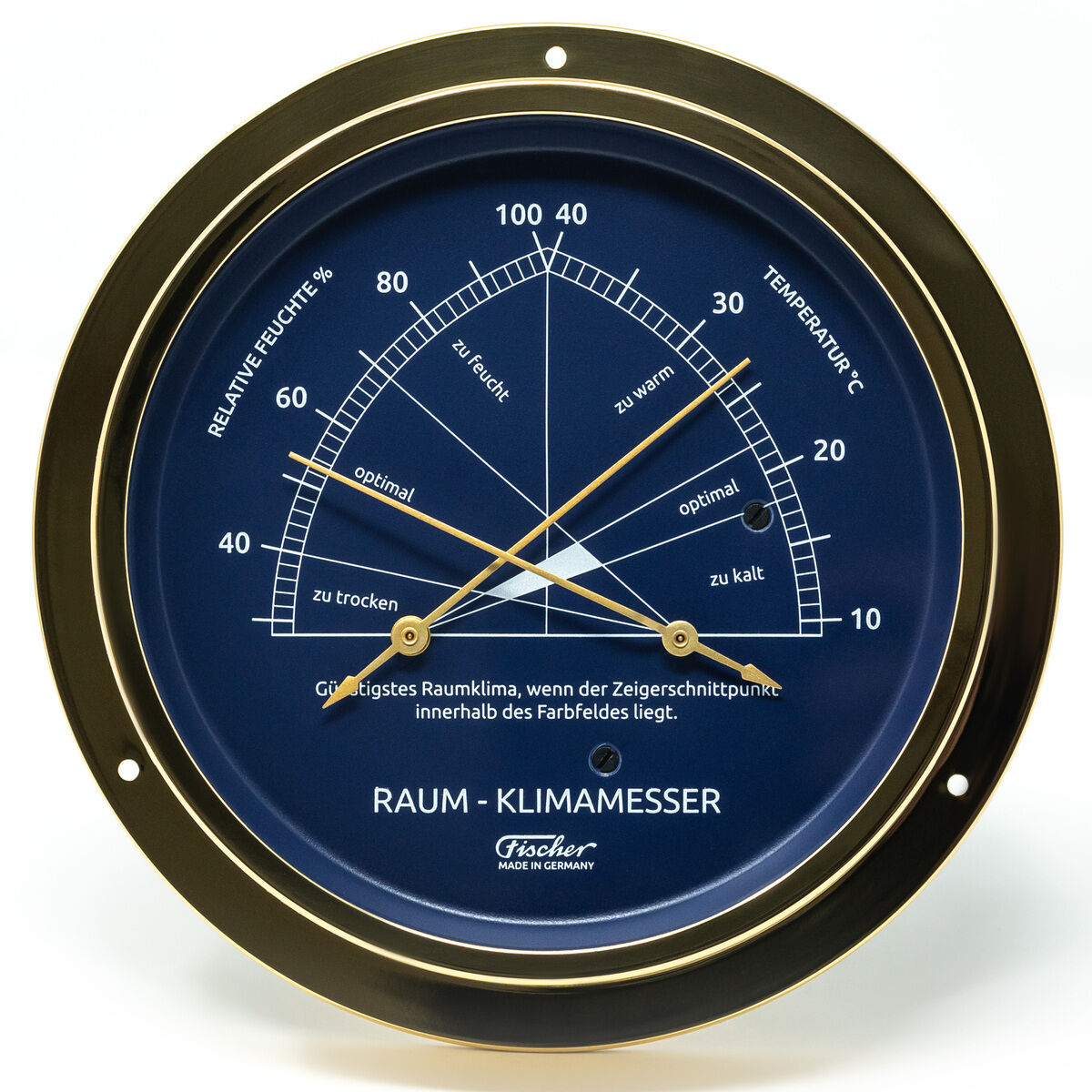 Abgebildet ist ein rundes Raumklimamessgerät der ZEIT Sonderedition mit poliertem Messingrahmen und blauer Anzeige. Das Gerät misst Luftfeuchtigkeit und Temperatur und zeigt verschiedene Messbereiche in weißer Schrift auf dunklem Grund an. Die Anzeige besitzt zwei goldene Zeiger für die unterschiedlichen Werte. Das Produkt hat ein elegantes, klassisches Design und ist gut lesbar.