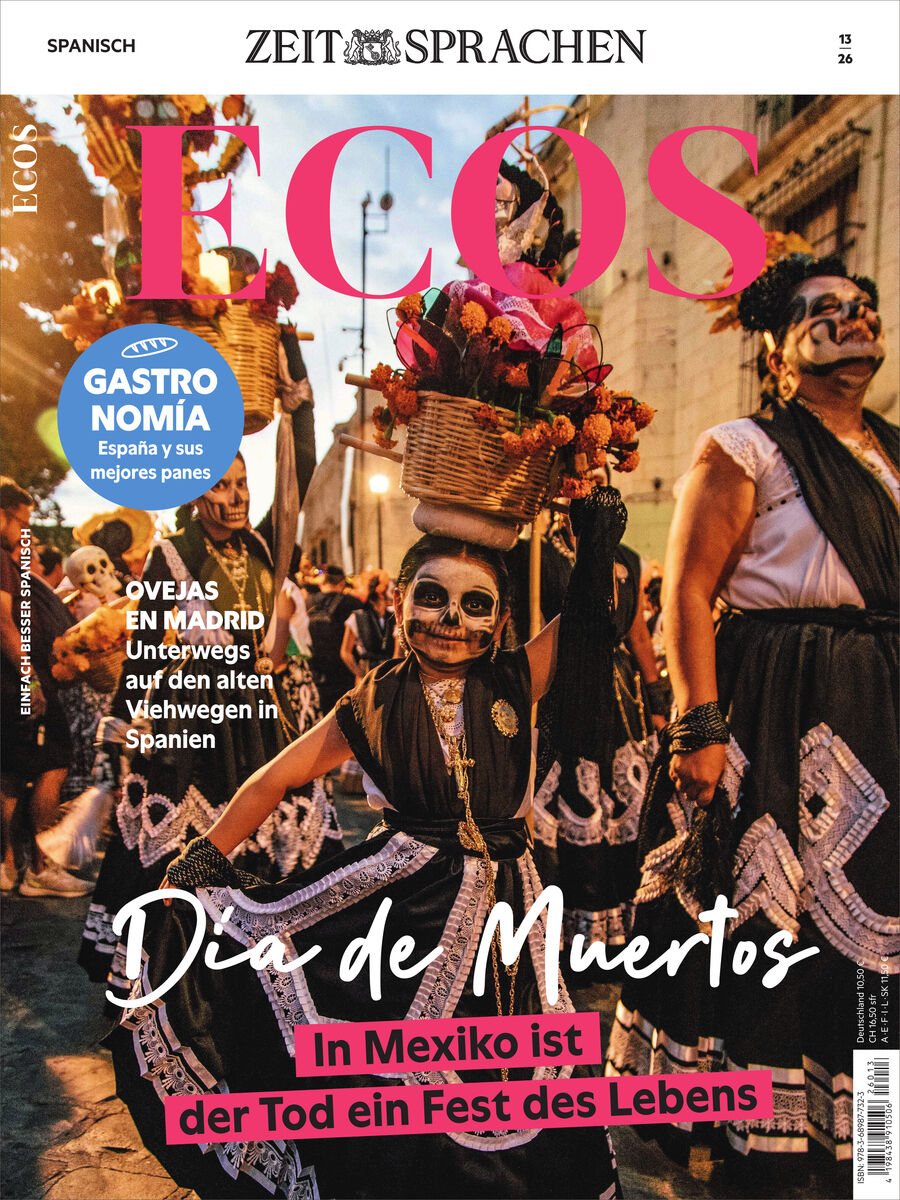 Cover des Spanischmagazins „ECOS“ von ZEIT SPRACHEN, Ausgabe 13/2026. Foto einer Día-de-Muertos-Parade in Mexiko: geschminkte Tänzerin mit Blumenkorb vor kostümierten Menschen. Pinker Titel und Aufmacher „Día de Muertos – In Mexiko ist der Tod ein Fest des Lebens“.