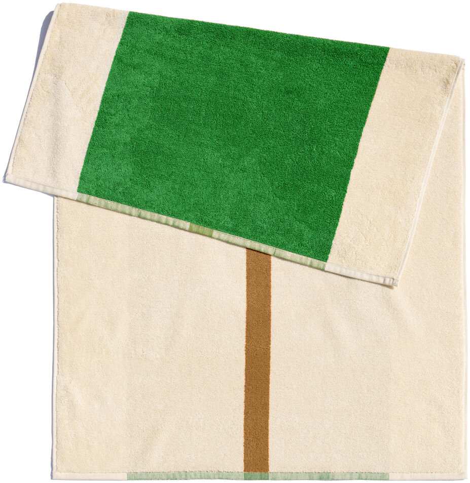 Badematte, 50 x 80 cm, mit einfachem Design in Grün und Beige. Die Matte ist rechteckig und besteht aus weichem Material.