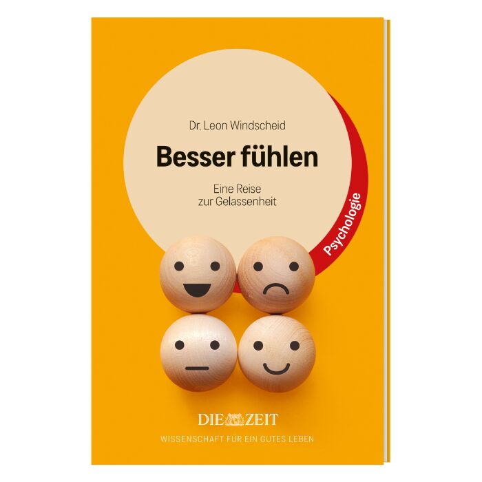 Das Buch »Besser fühlen« aus der ZEIT-Edition »Wissenschaft für ein gutes Leben« zeigt auf einem orangefarbenen Cover vier runde Holzkugeln mit unterschiedlichen Gesichtsausdrücken, die verschiedene Emotionen darstellen. Darüber sind Titel, Autor, Untertitel und das Themenfeld Psychologie deutlich sichtbar.