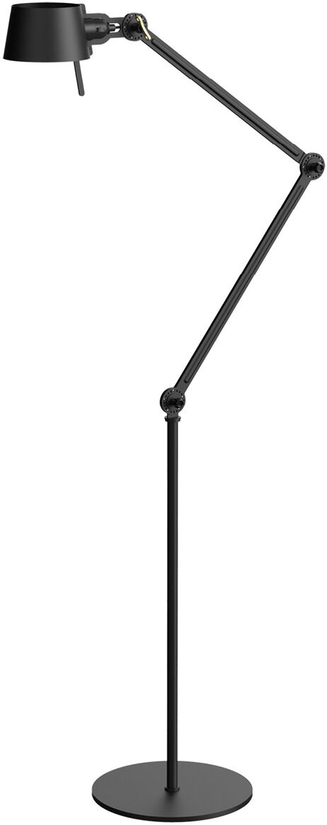 Schwarze Stehlampe BOLD mit zwei verstellbaren Armen, modernem Design und rundem Lampenschirm, geeignet für Wohnzimmer oder Arbeitsplatz.