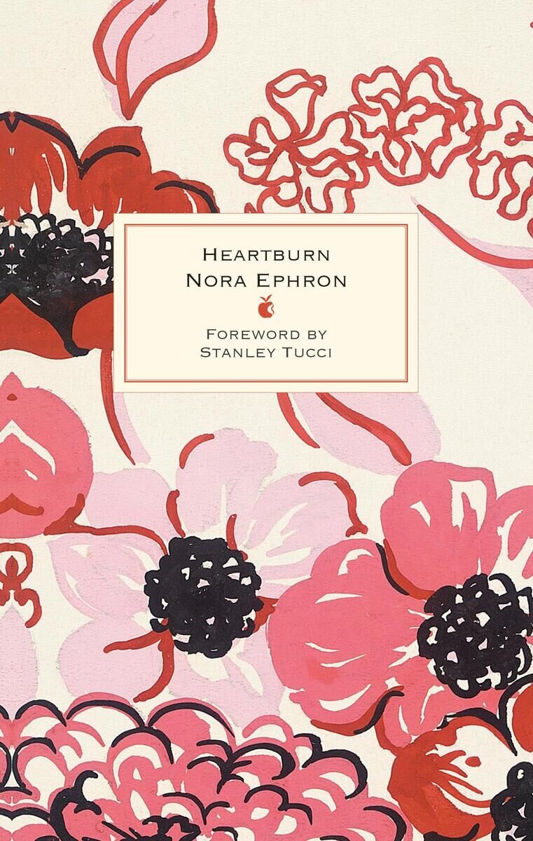 Buch 'Heartburn' von Nora Ephron mit einem Coverdesign, das florale Muster in Weiß, Rosa und Schwarz zeigt.