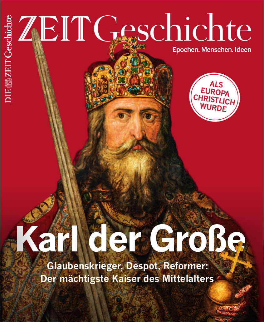 Magazincover von ZEIT Geschichte mit dem Titel 'Karl der Große'. Das Bild zeigt ein Porträt von Karl dem Großen in kaiserlicher Kleidung und Krone. Das Cover ist rot mit weißer Schrift und goldenen Akzenten.
