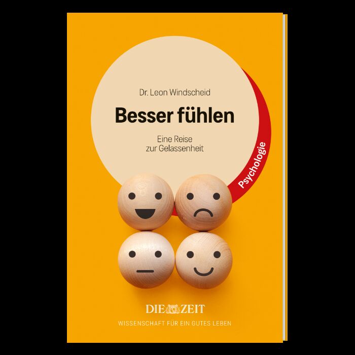Buchcover der ZEIT-Edition »Wissenschaft für ein gutes Leben«. Im Zentrum steht ein großer orangefarbener Kreis mit dem Titel 'Besser fühlen' und dem Untertitel 'Eine Reise zur Gelassenheit' von Dr. Leon Windscheid. Darunter sind vier Holzkugeln mit verschiedenen Gesichtern abgebildet, die unterschiedliche Emotionen darstellen. Der Hintergrund ist orangefarben, mit einem gelben Rand auf der rechten Seite. Das Buch richtet sich an alle, die sich für Psychologie, Emotionen und Wohlbefinden interessieren.