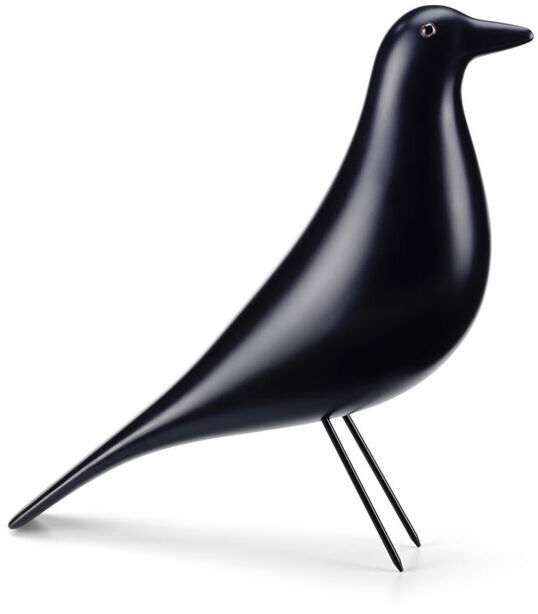 Eine stilvolle Holzfigur in Form eines Vogels, bekannt als 'Eames House Bird'. Die Deko-Objekt ist minimalistisch gestaltet und in schwarzer Farbe gehalten. Es steht auf zwei dünnen Beinen und hat eine elegante, moderne Erscheinung.