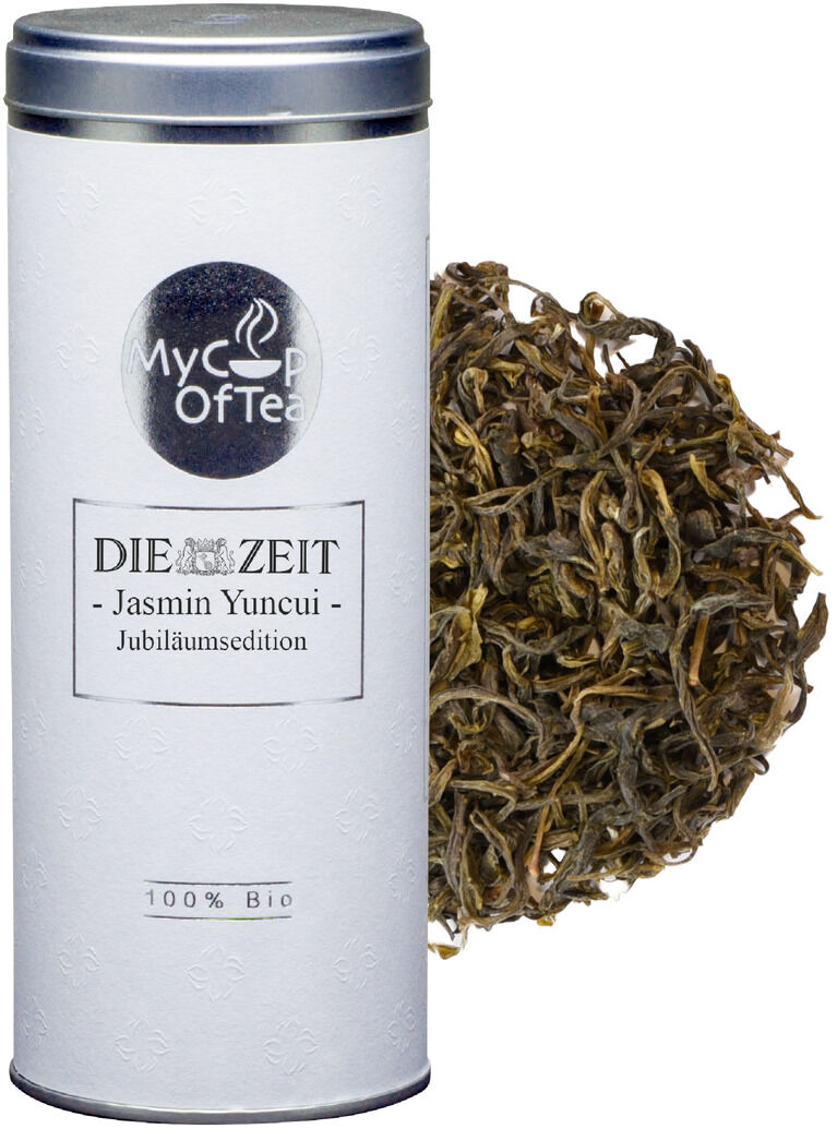 Tee-Set der ZEIT-Jubiläumsedition mit weißer Teedose und losem grünen Tee.