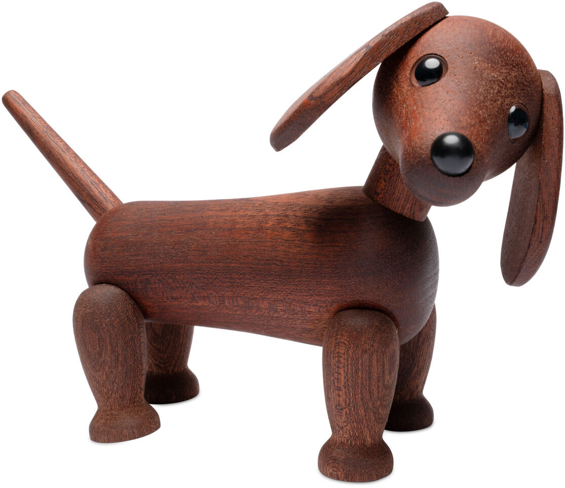Detailreiche Holzfigur eines Dackels namens "Dackel Quick" der Marke Spring Copenhagen. Die Figur besteht aus glattem, dunkelbraunem Holz mit beweglichen Ohren und Schwanz sowie glänzenden schwarzen Augen. Sie steht auf vier Pfoten vor weißem Hintergrund.