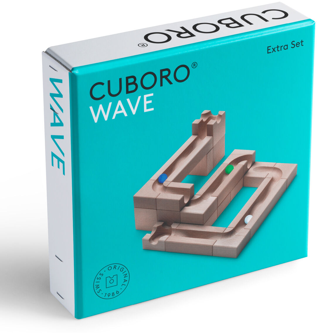 Cuboro Wave Extra Set, ein Bausatz für Kugelbahnen in einem türkisfarbenen Karton, zeigt hölzerne Bauteile, die auf der Verpackung abgebildet sind.